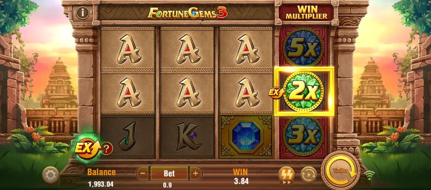 Fortune Gems 3 in a landscape layout, with the complete grid, central 2× multiplier and bottom controls visible; Bet is restored to 0.90.