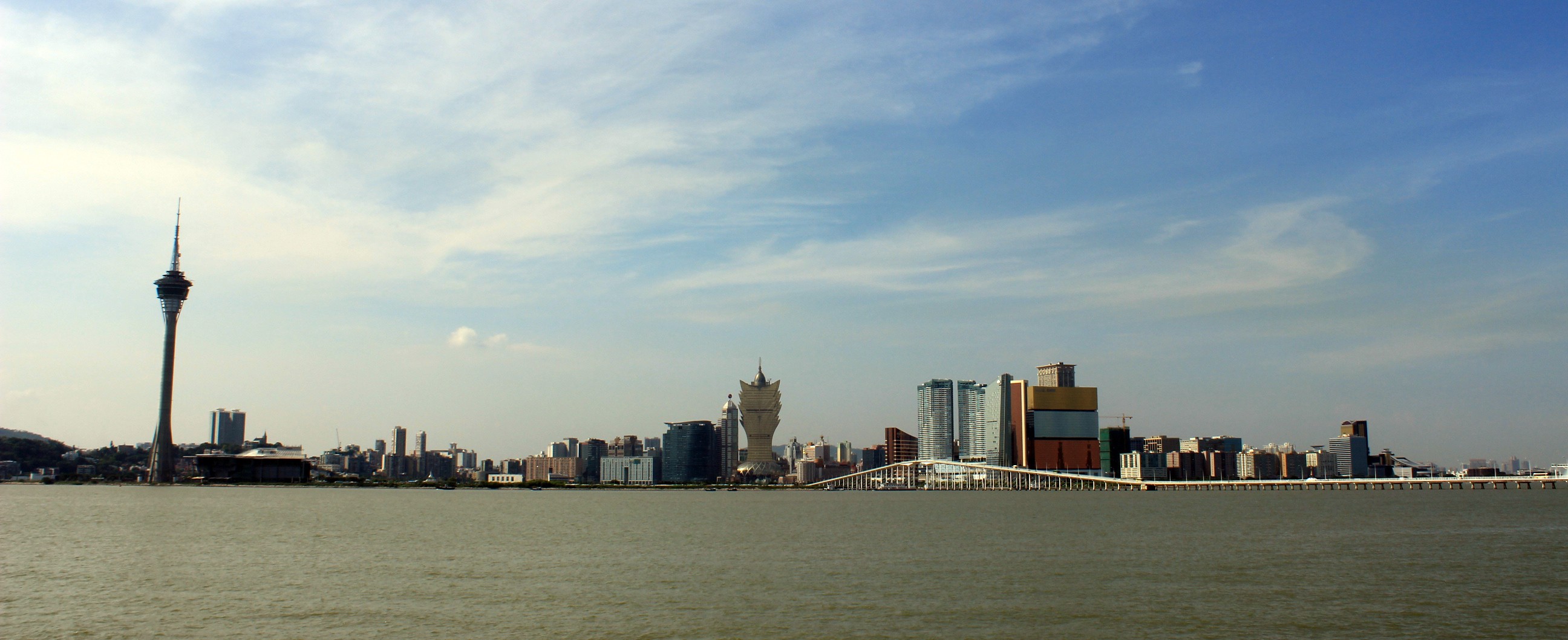 The Macau Peninsula skyline seen across the water from Taipa, with Macau Tower and the Sai Van Bridge