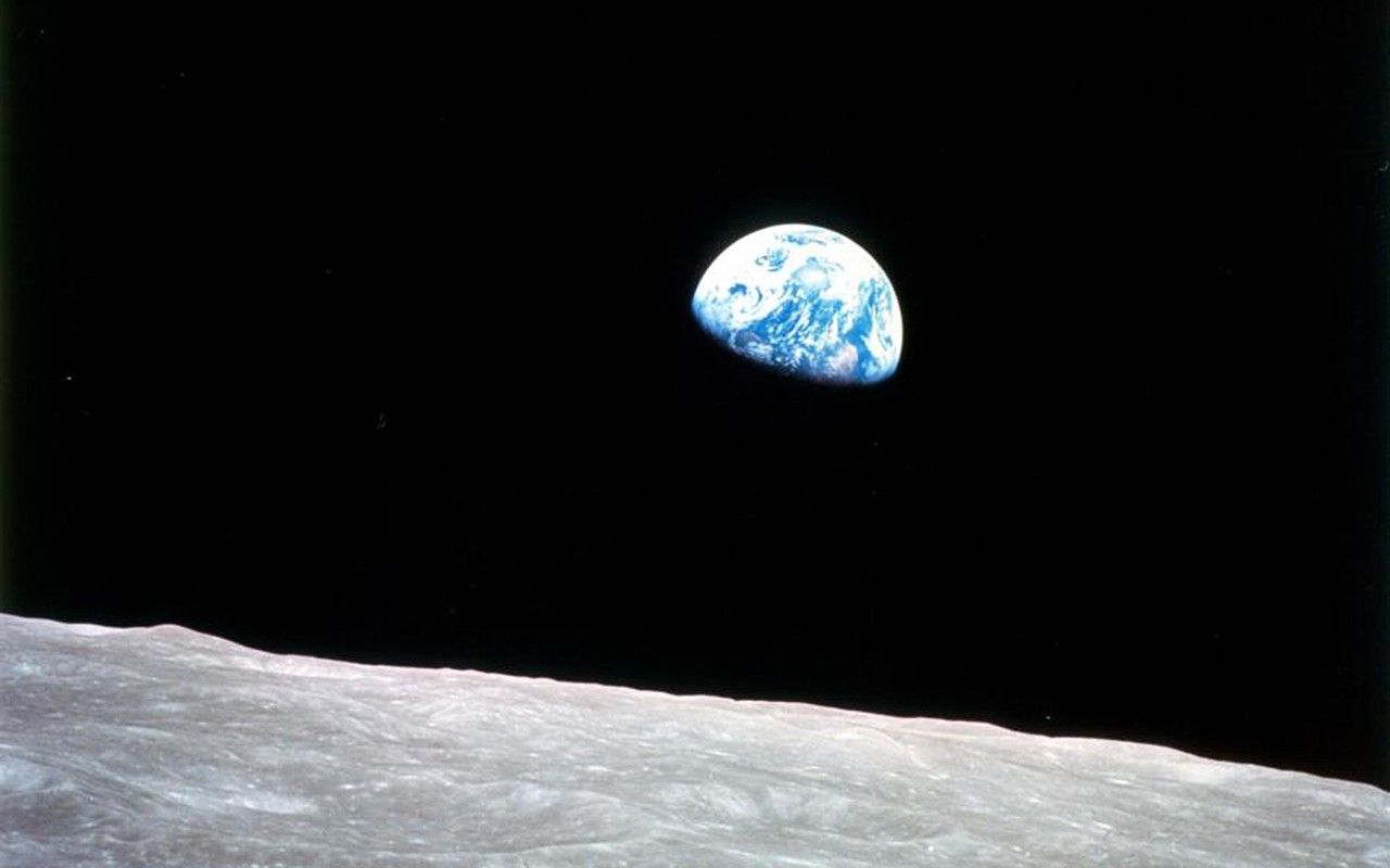 Earth rising above the lunar horizon in the Apollo 8 photograph from December 1968 Earth rising above the lunar horizon in the Apollo 8 photograph from December 1968