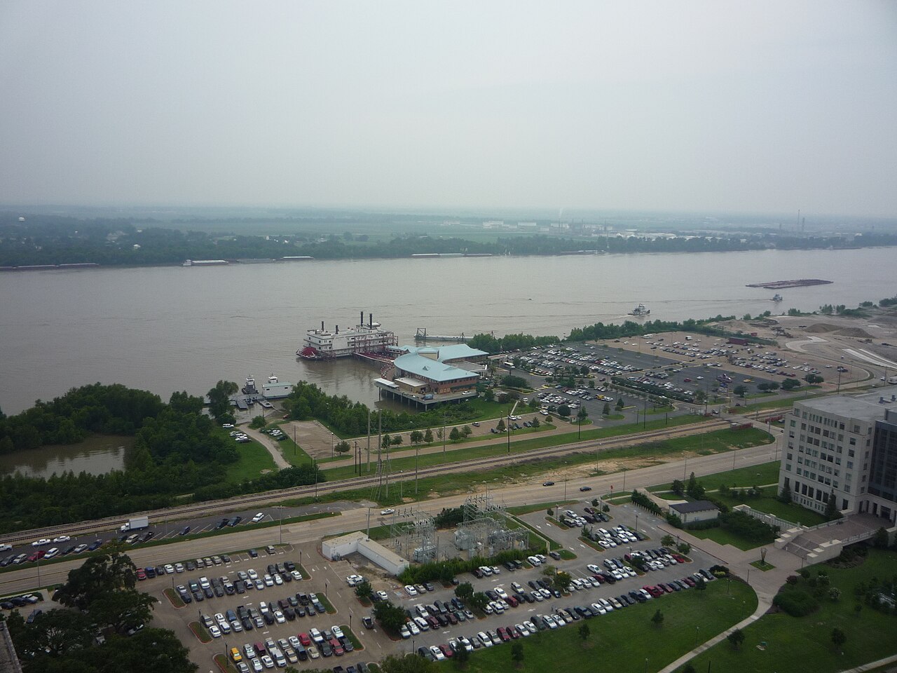 Riverboat casino moored on the Mississippi River in Baton Rouge, Louisiana, seen from above with its parking lots